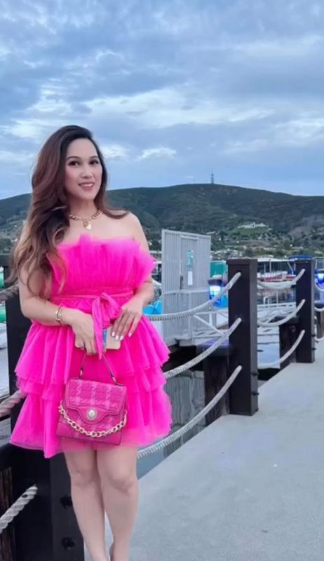 The original photo of a bright pink dress